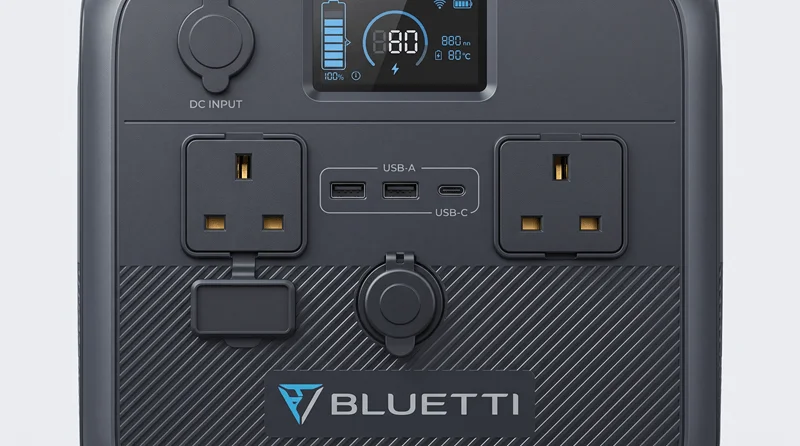 Close-up of a Bluetti Elite 200 V2 portable power station showing its outlets and digital display screen.