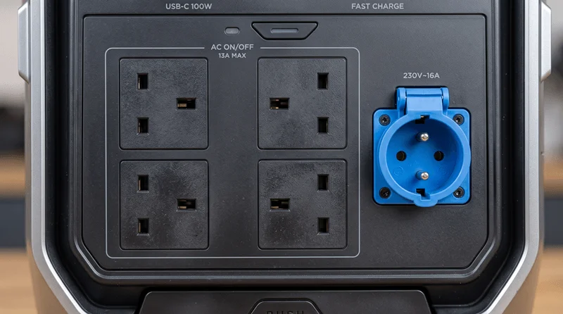 Close-up of four AC UK sockets and a blue outlet on an EcoFlow Delta Pro 3.